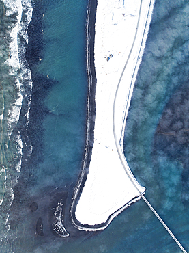 Aerial view by drone of the coastal road near to Selfoss during a cold winter day, Selfoss, Iceland, Polar Regions