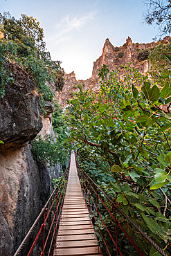 Pedestrian suspension bridge leading through the gorge of Los Cahorros Monachil, Monachil, Sierra Nevada, Granada, Andalusia, Spain, Europe