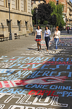 Painted writing on the floor of Franceza street by side of National Museum of Romanian History, Lipscani district, Old City, Bucharest, Romania