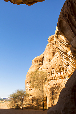 Entrance of the passage through the Siq channel at Jabal Ithlib area within the UNESCO World Heritage Site of Hegra , AlUla, Medina Province, Saudi Arabia, Middle East