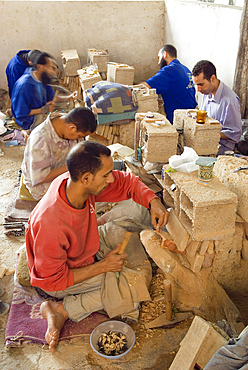 Workshop of cutting tiles for zelliges, Pottery district, Fes,Morocco,North Africa