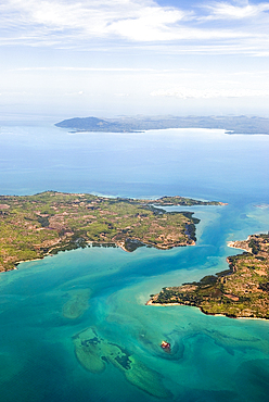 Aerial view over Ambato cape,Nosy Faly island and Nosy Be background ,Republic of Madagascar,Indian Ocean