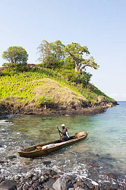 Fisherman in small cove Lagoa Azul on the north coast of Sao Tome Island, Republic of Sao Tome and Principe,Africa