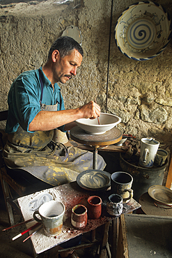 Andrew Mc Garva,potter, in his workshop,Aunay-en-Bazois,Nievre department, region of Burgundy, center of France,Europe