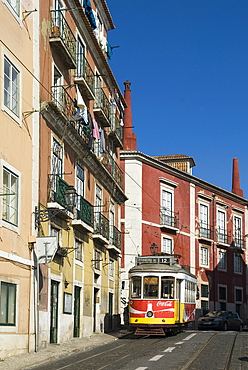 Tramway n°12 on Limoeiro street in Alfama district, Lisbon, Portugal, Europe