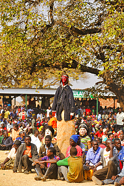 Masked stiltman, The Kulamba Traditional Ceremony of the Chewa people from Zambia, Mozambique and Malawi, held annually on the last Saturday in August to pay homage to their Chief Kalonga Gaia Uni, held near Katete, Eastern Province, Zambia, Africa