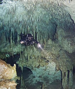 Technical diver in cave system, Mexico.