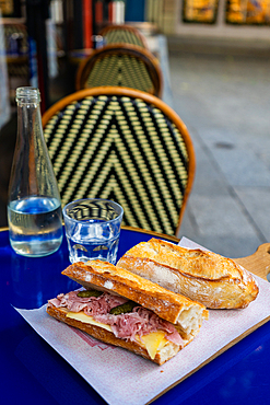 Ham and cheese baguette at a café in Paris