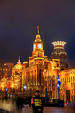 Magnificent view of brightly lit heritage buildings along the Bund at night, Shanghai, China