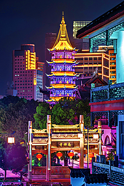 The pagoda of NanChan Temple at night, Wuxi City, Jiangsu, China. The temple was first built 1500 years ago but was destroyed. The existing pagoda was built in 1427.