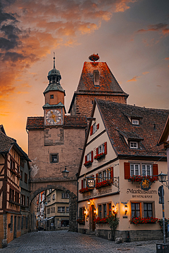 Rothenburg ob der Tauber, Bavaria, Germany. Medieval town of Rothenburg at sunrise. Plonlein (Little Square) and the two towers of the old city wall.