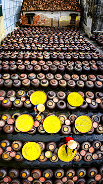 Local workers making soy sauce, aerial view, Hanoi, Vietnam