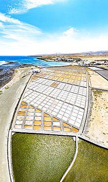 Panoramic aerial view of salt flats overlooking the ocean, Las Salinas Del Carmen, Fuerteventura, Canary Islands, Spain