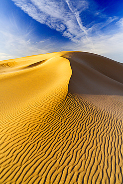 Golden sand dunes at sunset, Corralejo Natural Park, Fuerteventura, Canary Islands, Spain