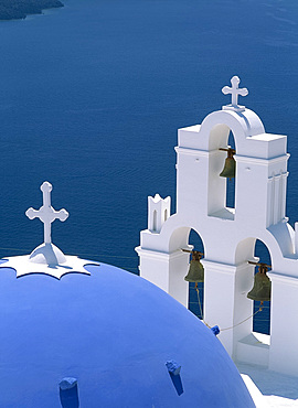 Close-up of the blue dome and bell tower of the Agiou Mina Church, high above the sea at Firostephani near Fira Town, Santorini (Thira), Cyclades, Greek Islands, Greece, Europe