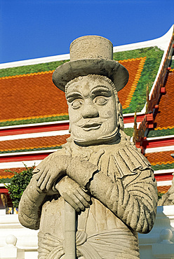 Close-up of a stone statue of a Farang guard at the temple of Wat Pho in Bangkok, Thailand, Southeast Asia, Asia