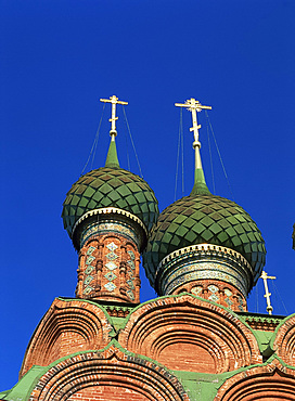 Close-up of brick arches and green onion domes of the Church of the Epiphany, at Yaroslavi, the Golden Ring, Russia, Europe