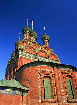 The Church of the Epiphany, a brick building with green decorative tiles and roof, at Yaroslavi, the Golden Ring, Russia, Europe