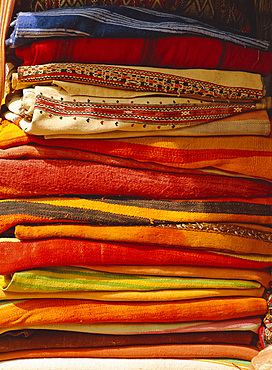 Pile of carpets in the souk, Marrakech, Morocco