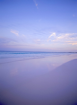 Sea and sand at sunset at Pink Sands Beach, Harbour Island, Eleuthera, The Bahamas