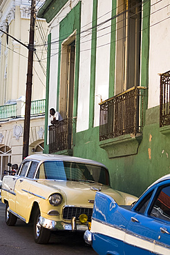 1950's vintage American cars parked in Santiago de Cuba, Cuba, West Indies, Central America