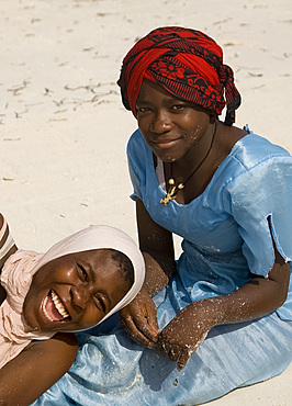 Local women in colourful dress on the beach, Paje, Zanzibar, Tanzania, East Africa, Africa