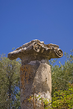 An ornate stone carved column in the village of Argyroupoli which is on the site of the Hellenistic town of Lappa in western Crete, Greece, Europe