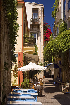 Traditional tables and chairs at Tamam Taverna on a backstreet in Hania, Crete, Greek Islands, Greece, Europe