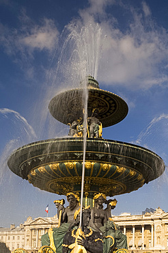 An ornate gilded fountain and statues in the Place de la Concorde, Paris, France, Europe