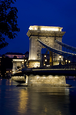 The Chain Bridge over the River Danube and the Royal Palace at dusk, Budapest, Hungary, Europe