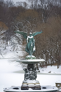 Snow covered statue at Bethesda Fountain in Central Park, New York City, New York State, United States of America, North America