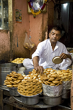 A man cooking street food in Old Delhi, India, Asia