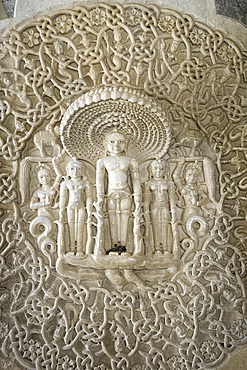 A carved marble disc inside the main Jain temple at Ranakpur, Rajasthan, India, Asia