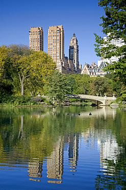 A view of the Bow Bridge and the lake in Central Park in autumn, New York City, New York State, United States of America, North America