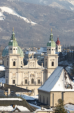 Salzburg Cathedral and snow covered mountains behind, Salzburg, Austria, Europe