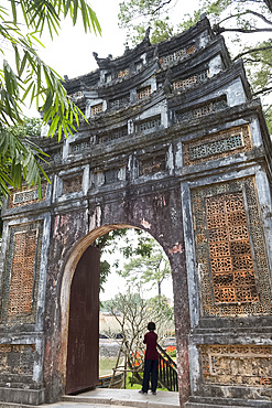 An ornately decorated gate in the grounds of the Tu Duc Tomb near Hue, Vietnam, Indochina, Southeast Asia, Asia