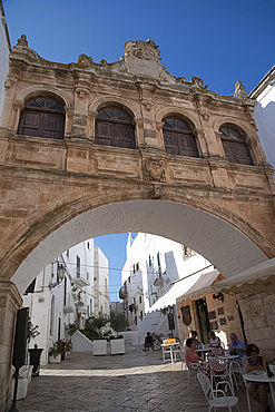 A Baroque style arch in the Centro Storico of the medieval city of Ostuni, Puglia, Italy, Europe