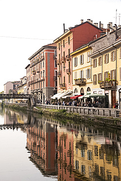 Old buildings reflected in the Naviglio Grande, Milan, Lombardy, Italy, Europe