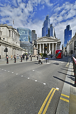 Skyscrapers of the City of London rising behind the Bank of England and the Royalo Exchange