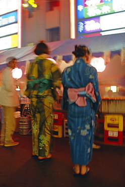 Japanese kimonos (defocussed), summer festival, Tokyo, Japan, Asia