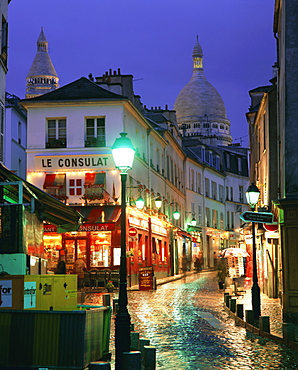 Rainy street and dome of the Sacre Coeur, Montmartre, Paris, France, Europe