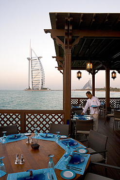 The Burj Al Arab, the world's first seven star hotel (five star deluxe), built on an artificial Island offshore from the Jumeirah Beach hotel, Dubai, United Arab Emirates, Middle East