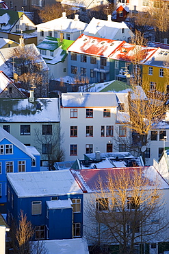 Low aerial view from Hallgrimskirka of the colourful houses and commercial buildings of the city, Reykjavik, Iceland, Polar Regions