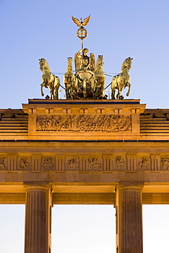 Quadriga on Brandenburger Tor (Brandenburg Gate) illuminated at night in Pariser Platz, Berlin, Germany, Europe