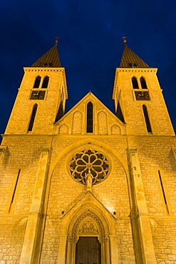 The 19th century Catholic cathedral illuminated at dusk, Bascarsija district, Sarajevo, Bosnia Herzegovina, Europe