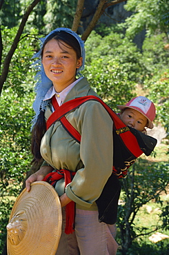 Portrait of mother and baby, Kunming, China, Asia