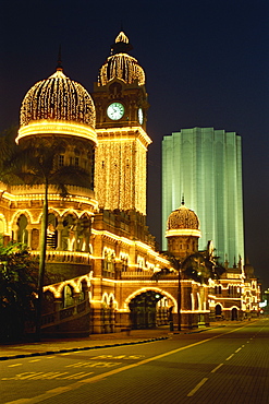 The Sultan Abdul Samad building dating from 1894, illuminated at night in Merdeka Square in the city of Kuala Lumpur, Malaysia, Southeast Asia, Asia