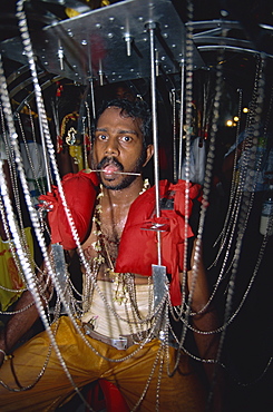 Man with pierced tongue at the annual Hindu festival of Thaipusam at the Batu Caves near Kuala Lumpur, Malaysia, Southeast Asia, Asia