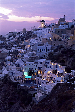 Windmill and village of Oia, island of Santorini (Thira), Cyclades, Greece, Europe