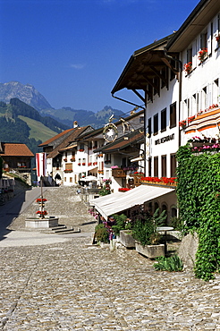 Main street and 17th century houses, Gruyeres, Fribourg Canton, Switzerland, Europe